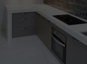 Concrete Kitchen Countertops With Melamine Cabinets Background